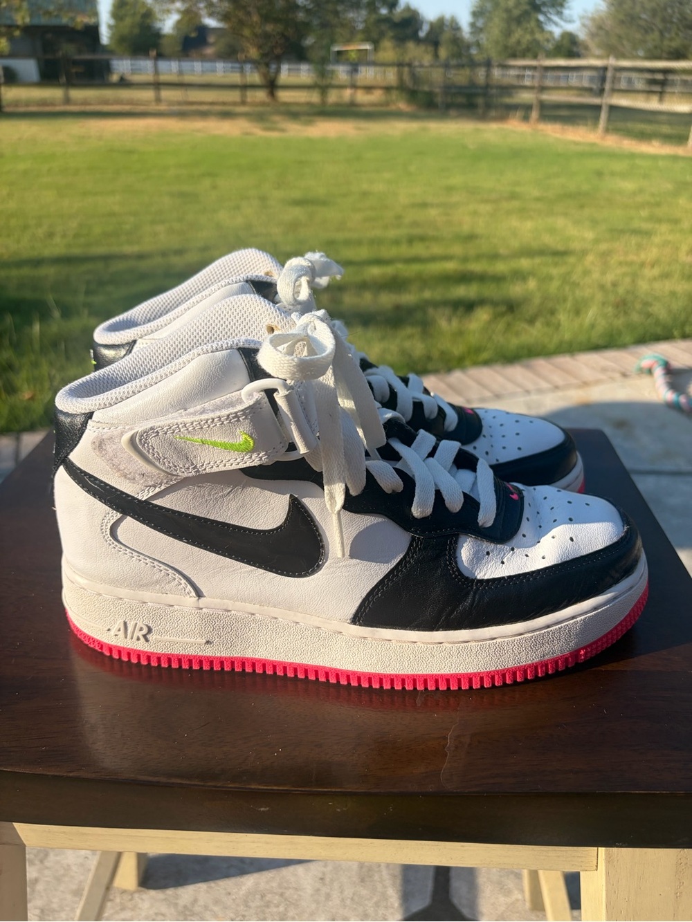 Nike Women’s White and Black High-Top Sneakers with Pink Sole